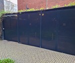 Pulverlakeret hulpladehegn - specialbygget cykelskur.jpg