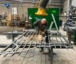 Smedejernsport - renovering af hegn og porte.jpg